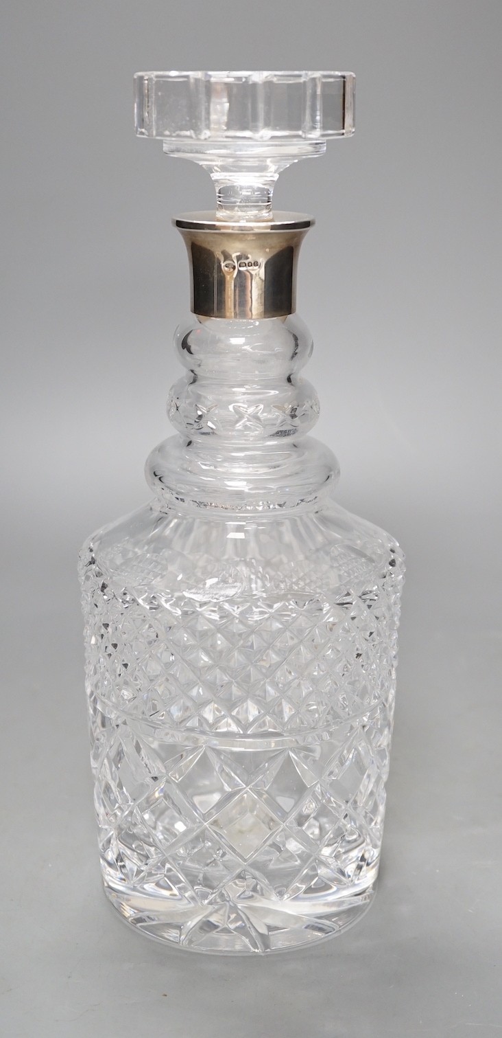 A silver mounted cut glass decanter - 28.5cm tall